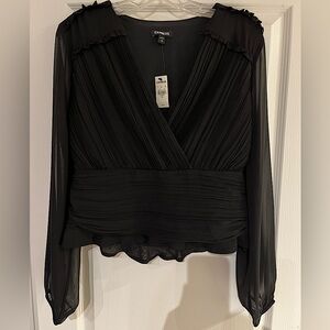 Detailed black long-sleeved top